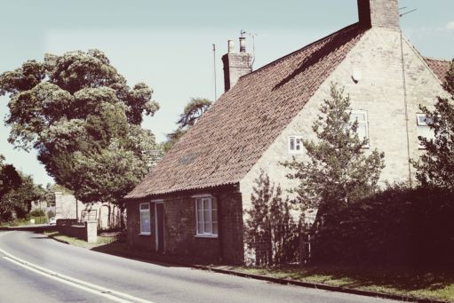 A picture of a cottage on High Street